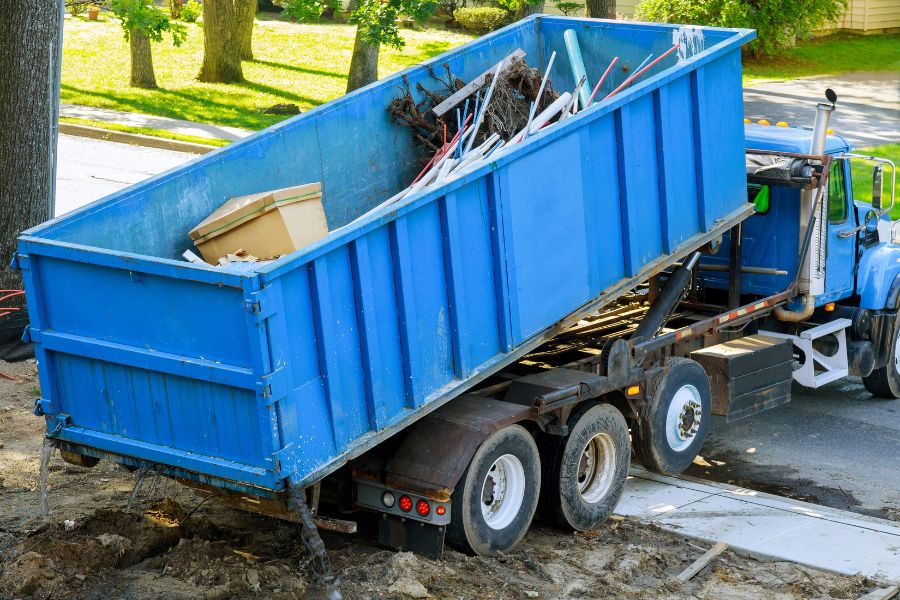 blue-dumpster-for-residential-junk-removal-austin-tx_commercial-junk-removal-junk-hauling-residential-junk-removal-Austin-TX-service